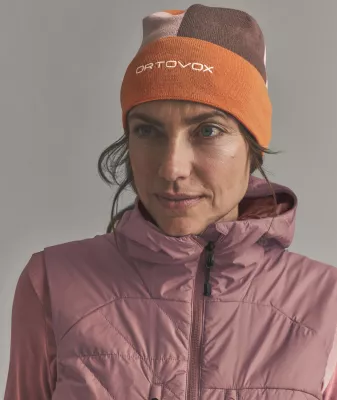 ORTOVOX PATCHWORK BEANIE faded tangerine čepice ORTOVOX PATCHWORK BEANIE faded tangerine čepice